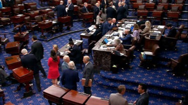 Senators on the chamber floor during an all-night vote session in Washington, D.C.