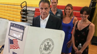 Andrew Cuomo speaking at podium in New York City campaign event