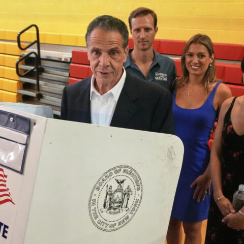 Andrew Cuomo speaking at podium in New York City campaign event