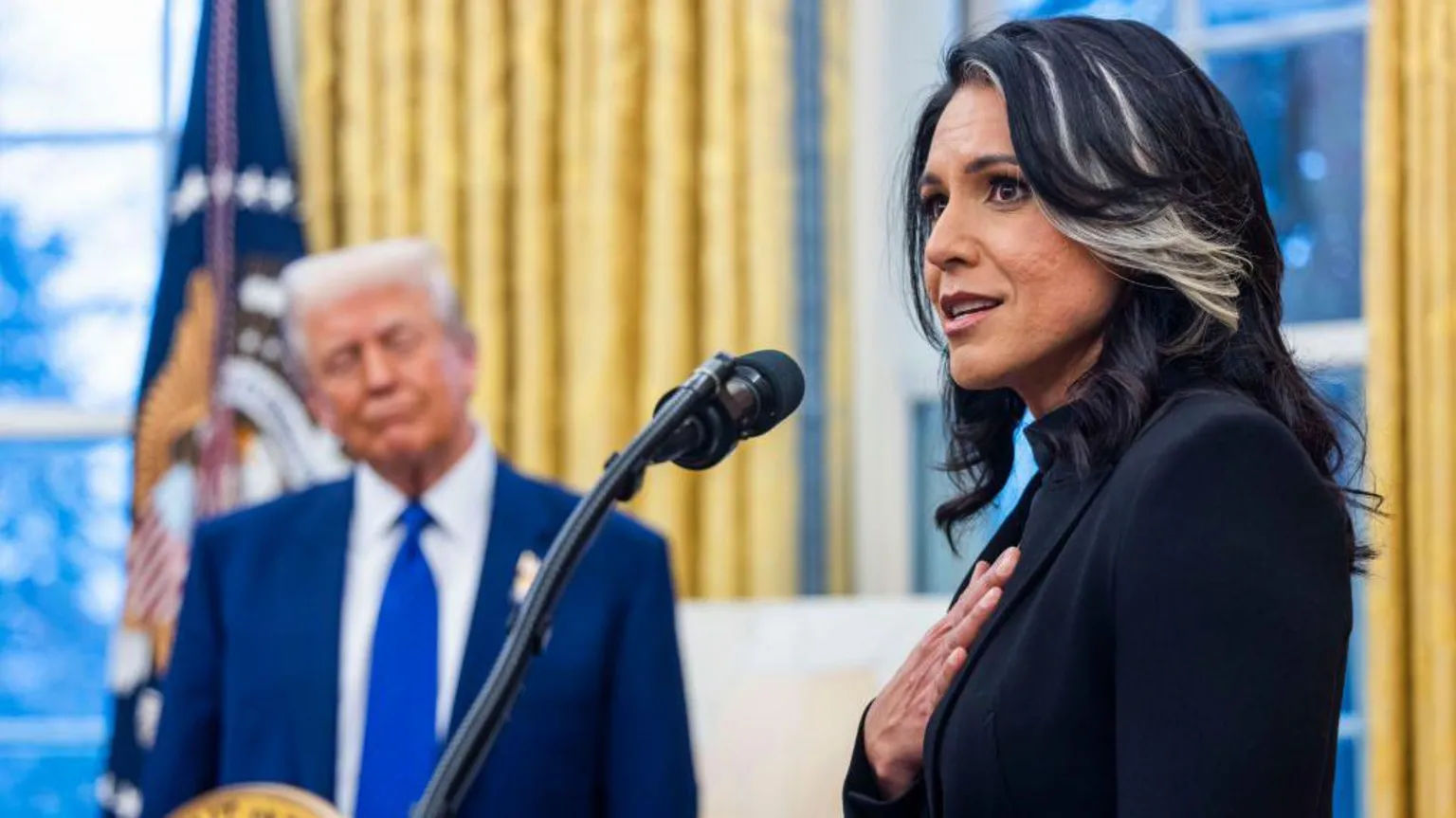 Tulsi Gabbard reverses position on Iran nuclear threat while Trump looks on