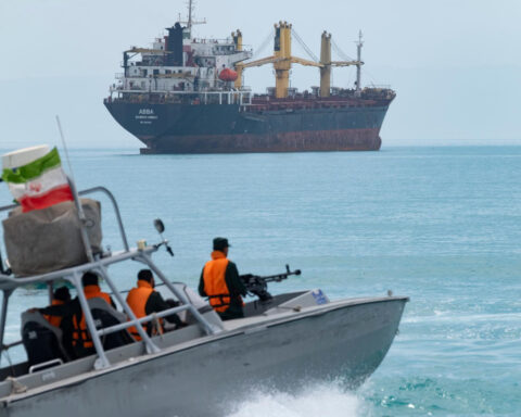 Speedboat patrols Strait of Hormuz during Iranian marine display