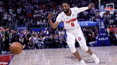Malik Beasley Misses a Pass on an NBA Court.