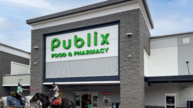 Knights in costume with outside Publix Jousting