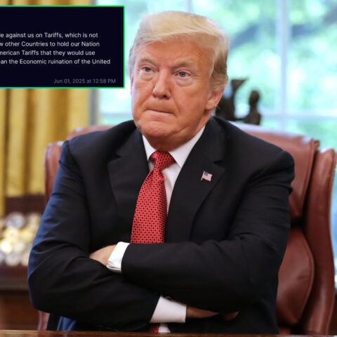 Donald Trump sits with arms crossed in the Oval Office