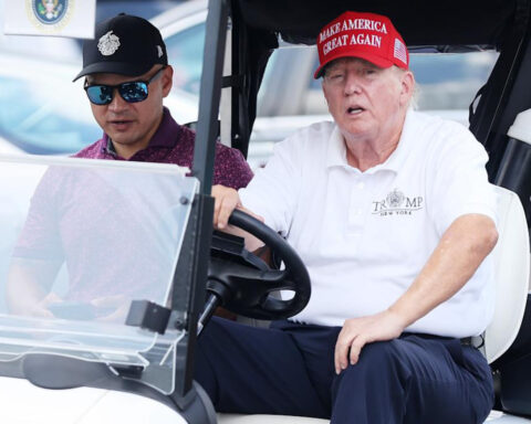 Donald Trump driving golf cart at Bedminster after failed health inspection