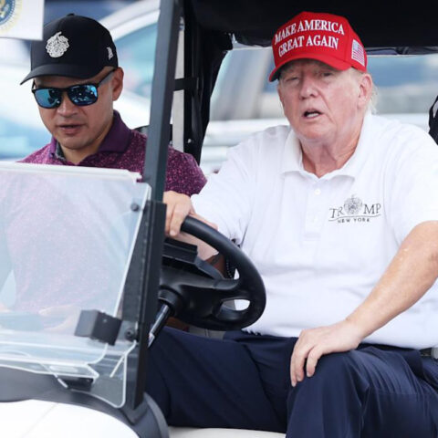 Donald Trump driving golf cart at Bedminster after failed health inspection