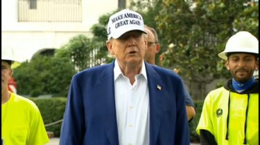 Trump speaking outside White House, gesturing while criticizing Jerome Powell