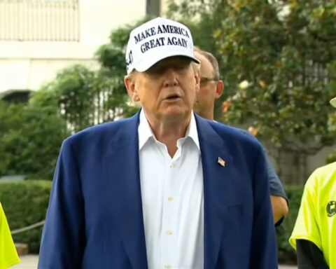 Trump speaking outside White House, gesturing while criticizing Jerome Powell