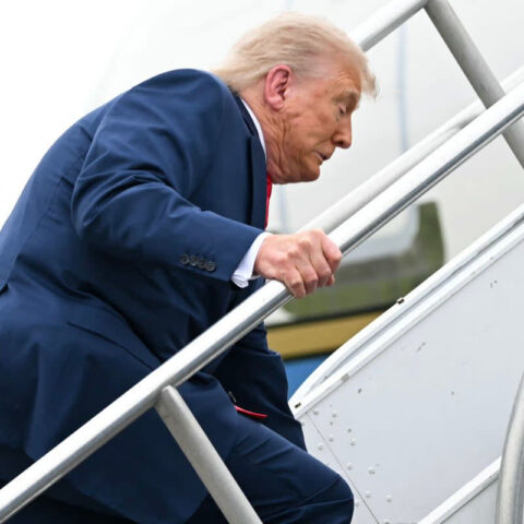 Donald Trump stumbles while climbing stairs to Air Force One