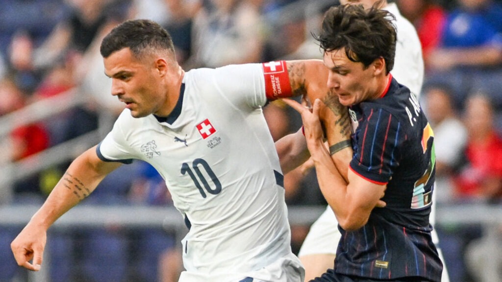 US soccer player struggles against Switzerland’s captain during a friendly match loss