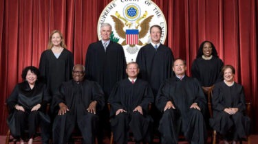 Nine Supreme Court justices, dressed like Hogwarts faculty, prepare to overrule lunch