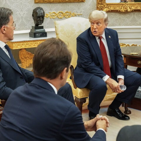 Donald Trump speaks with foreign leaders during a White House meeting