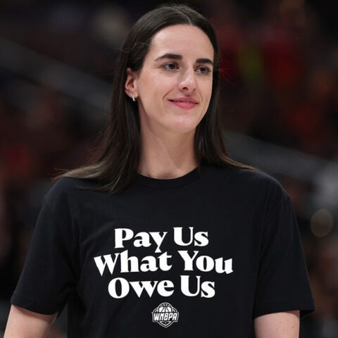 Caitlin Clark wearing shirt that says “Pay Us What You Owe Us” during WNBA All-Star Weekend