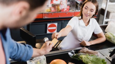 Man refusing to use self-checkout kiosk at grocery store