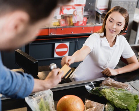 Man refusing to use self-checkout kiosk at grocery store