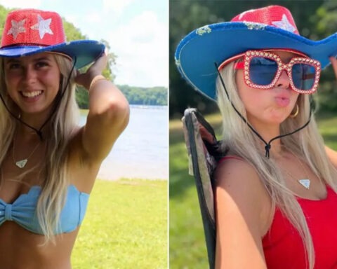 Haliey Welch speaking at a press event with sunglasses and cowboy hat