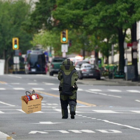 Bomb squad technician approaches suspicious package outside the White House