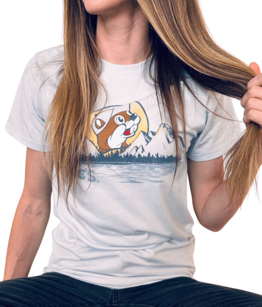 Woman wearing Buc-ee’s t-shirt pulling hair playfully