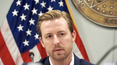 Ryan Walters speaking at a press conference in Oklahoma