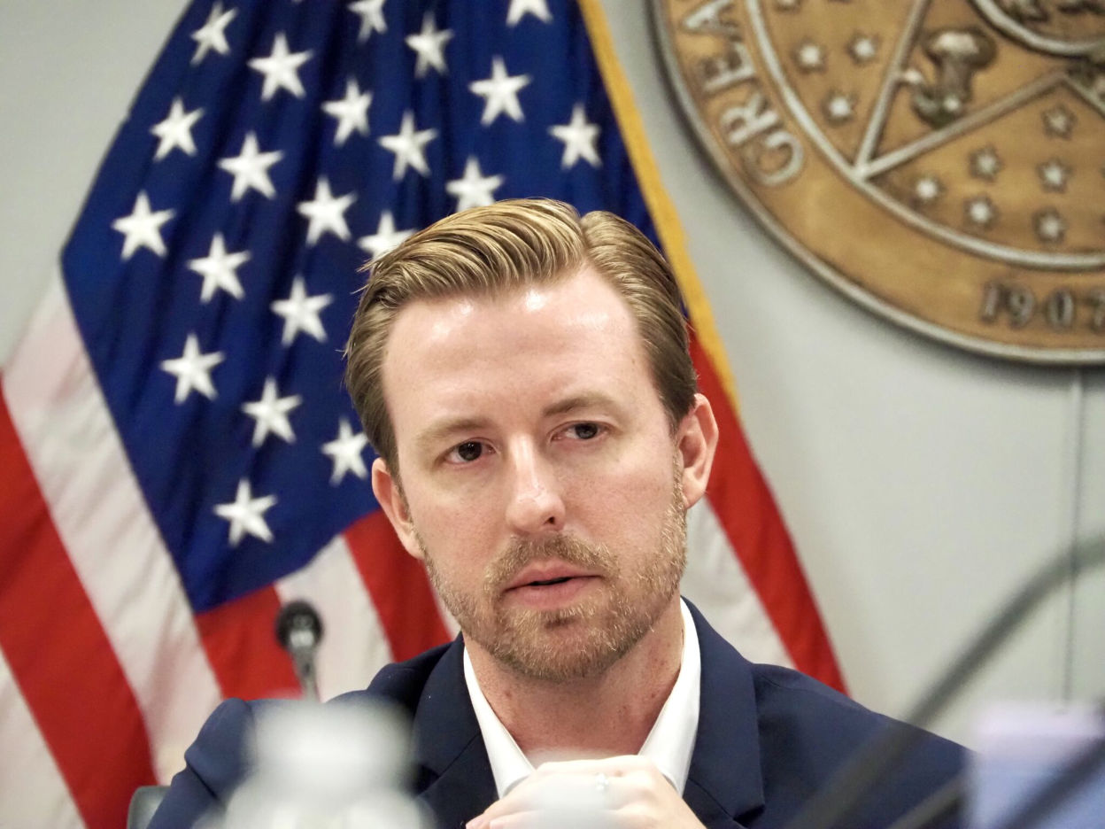 Ryan Walters speaking at a press conference in Oklahoma