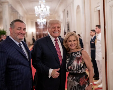 Ted Cruz, Donald Trump, and Heidi Cruz smiling at White House dinner