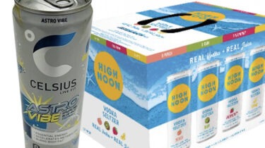 Celsius energy drink can next to a High Noon vodka seltzer variety pack