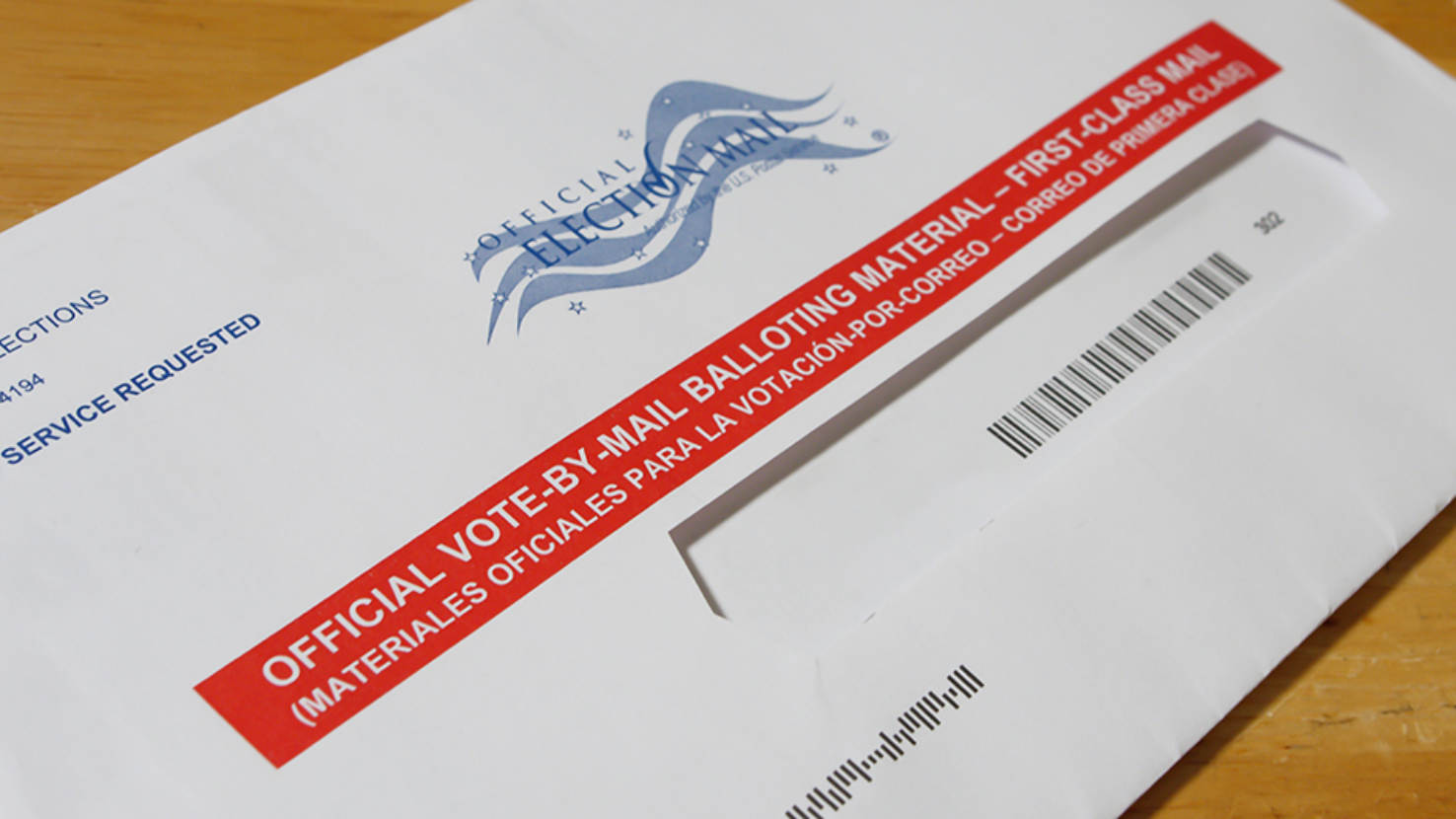 Official vote-by-mail ballot envelope on a table
