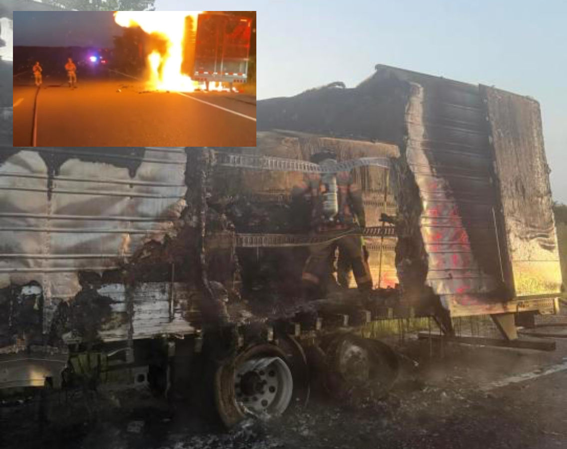 Tractor trailer engulfed in flames on Missouri highway.