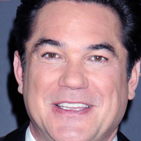 Dean Cain smiles on red carpet at awards event