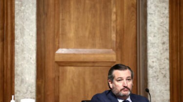 Ted Cruz sitting alone at Senate hearing