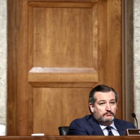 Ted Cruz sitting alone at Senate hearing