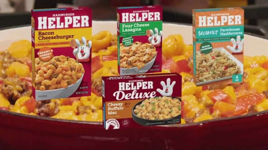 A pot of Hamburger Helper cooking on a stovetop.