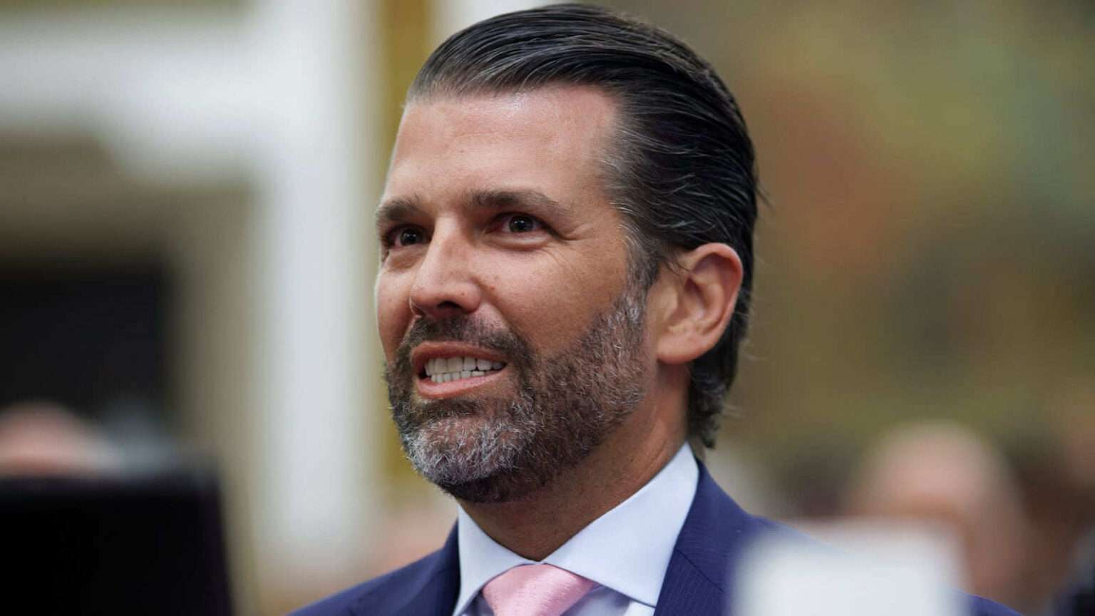 Donald Trump Jr smiling during an event in Washington, D.C.