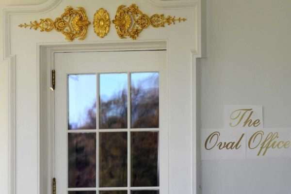 Trump’s Gold Oval Office Sign Sparks Outrage, Shines Brighter Than National Debt