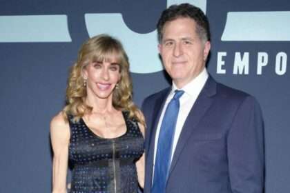 Michael and Susan Dell posing together at a public event.